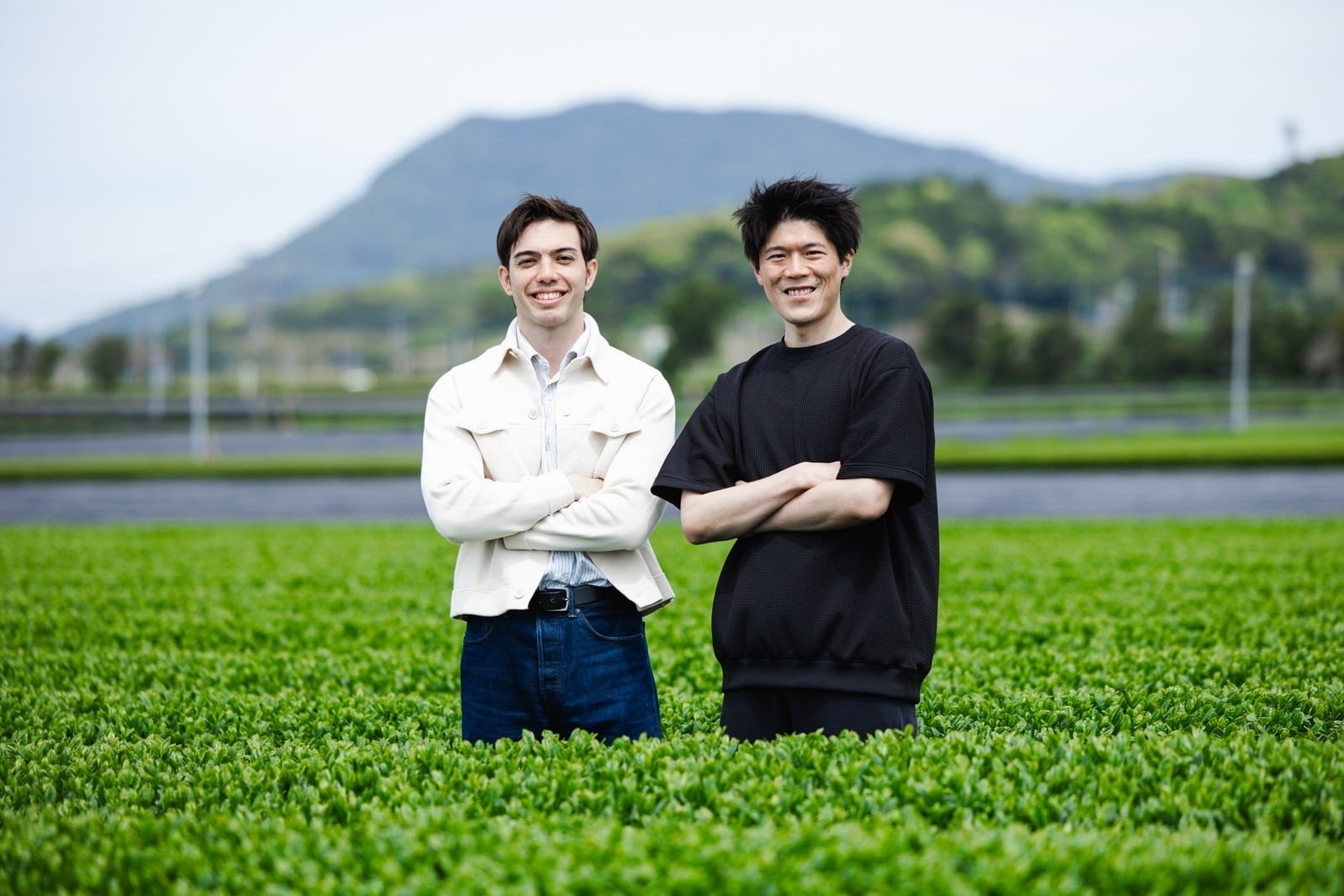 The RIKYU team standing in a tea field